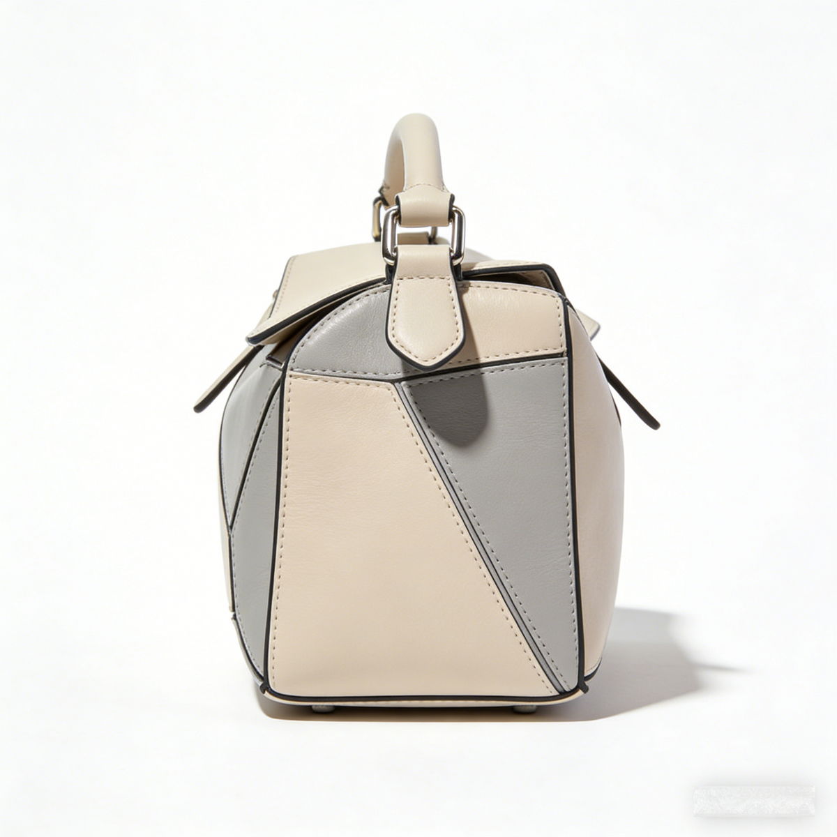 GeoPuzzle Puzzle: The Two-Tone Leather Top-Handle Handbag