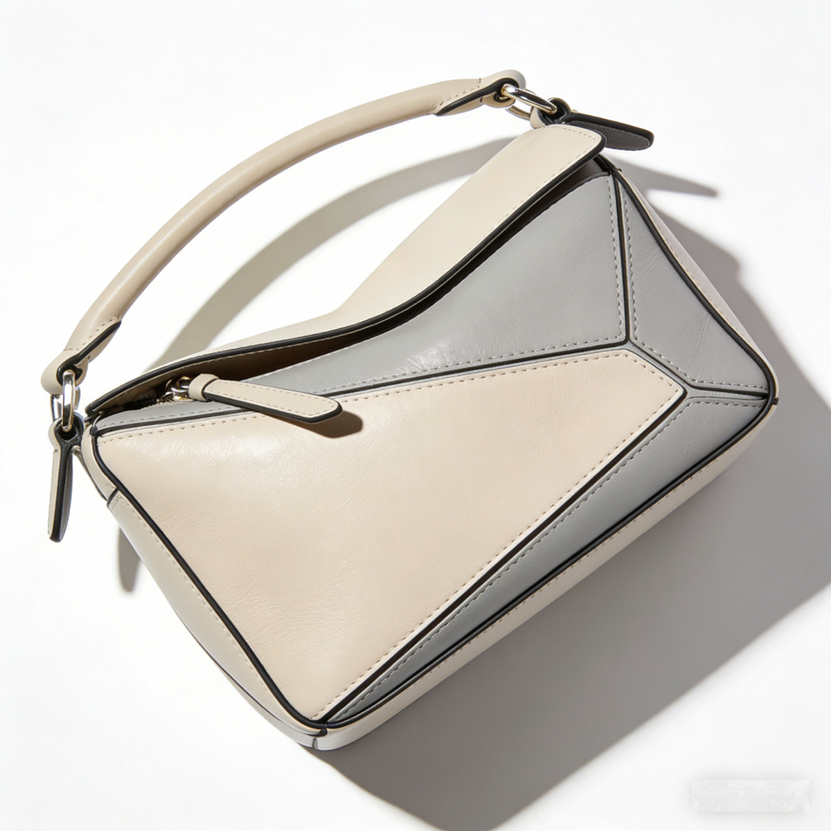 GeoPuzzle Puzzle: The Two-Tone Leather Top-Handle Handbag