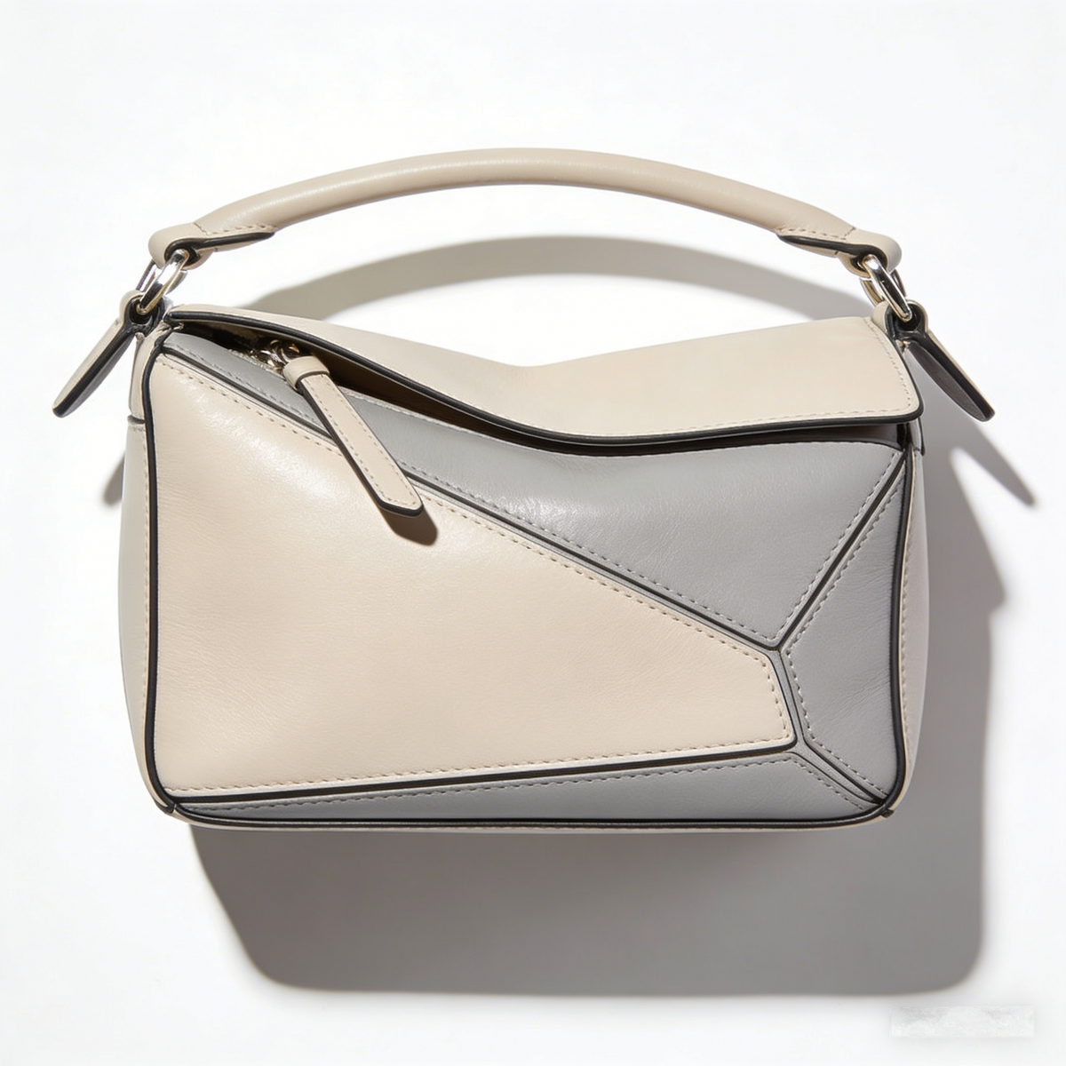 GeoPuzzle Puzzle: The Two-Tone Leather Top-Handle Handbag